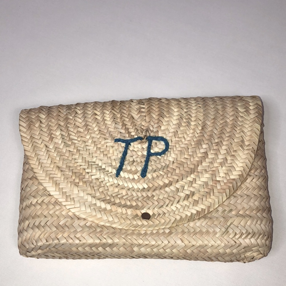 Like new Poolside collective L’enveloppe straw clutch